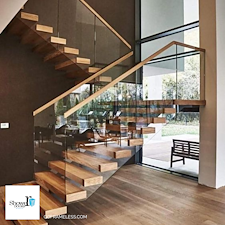 Elevate-Your-Home-with-Glass-Staircase-Railings-The-Perfect-Blend-of-Style-Space-and-Safety 1