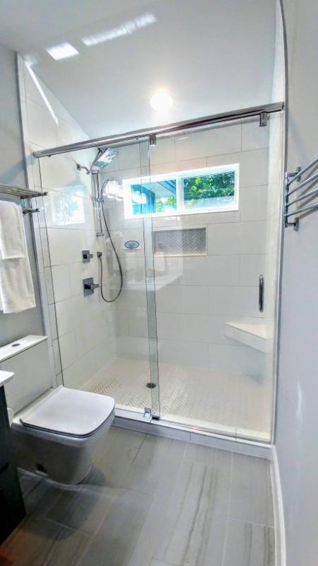 What is The Difference Between Pivoting and Sliding Shower Doors?