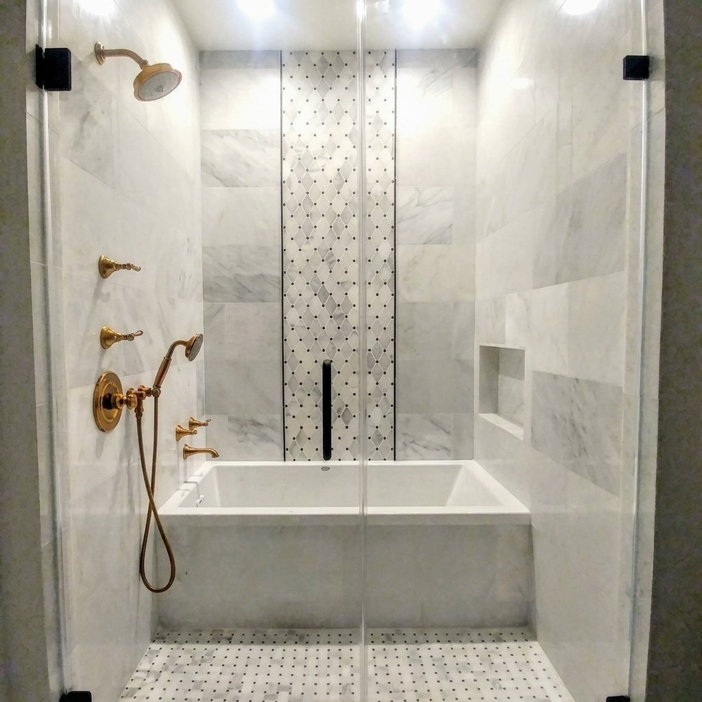 Frameless glass shower door in an arched alcove with brass fixtures