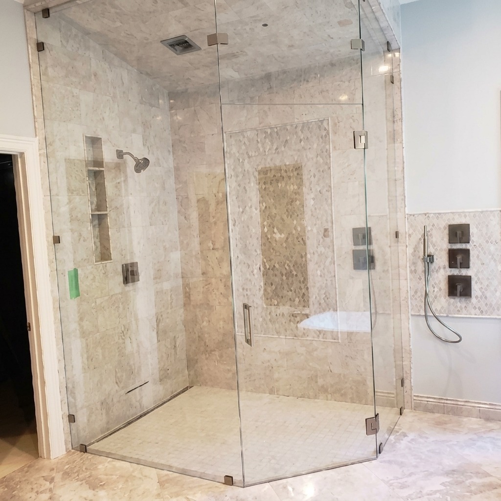 Neo-angle frameless glass shower with travertine tile