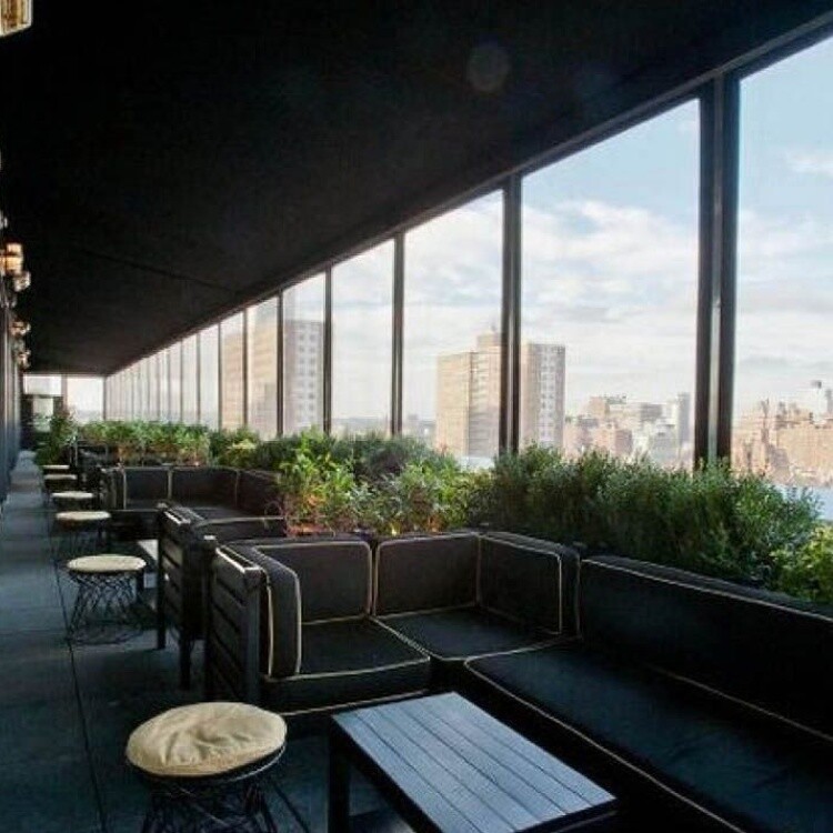 Rendering of a covered rooftop terrace with lounge seating