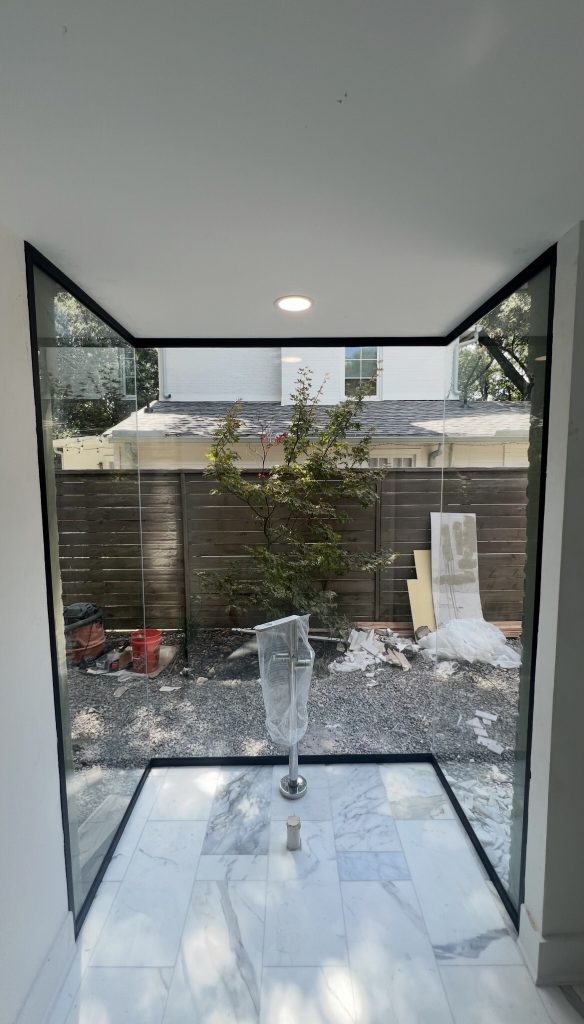 Custom commercial glass enclosure with U-channel framing in Dallas, TX