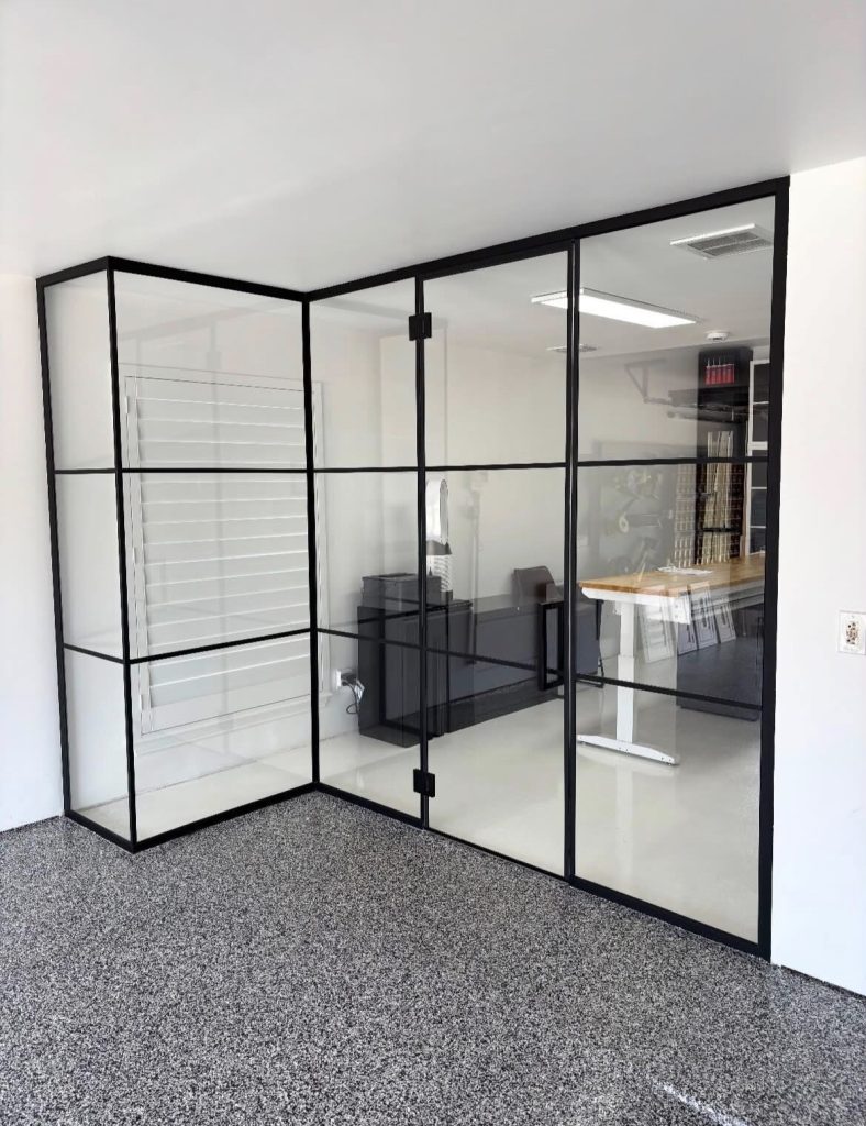 Frameless glass office partition with a black gridscape design in McKinney, TX